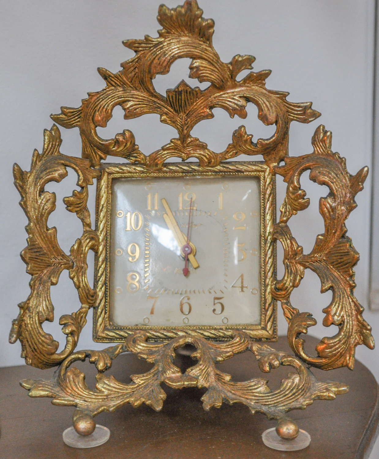 This fancy-schmancy antique-looking clock is actually a Guild Crest "boudoir electric alarm clock," according to the Google, and "hard to find"—yet I instantly found one just like it on eBay for $39 when I looked it up online. Mine, of course, was a gift. LOL.